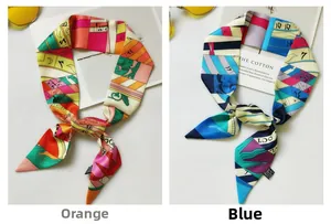 Detail view of colorful faux silk twilly scarves in orange and blue color options