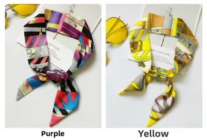 Detail of premium silk-like scarves in purple and yellow with modern geometric patterns
