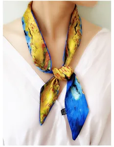 Detail of artistic narrow scarf featuring oil painting print styled with a white shirt