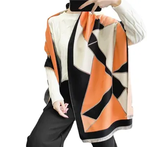 Thick geometric color-block shawl scarf with tassels in orange, black and beige