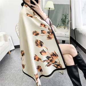Elegant beige cashmere-feel shawl featuring orange tulip floral print and soft fringes
