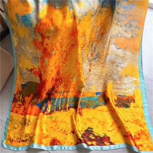 Detail of artistic oil painting silk scarf with vibrant yellow and blue impressionist pattern