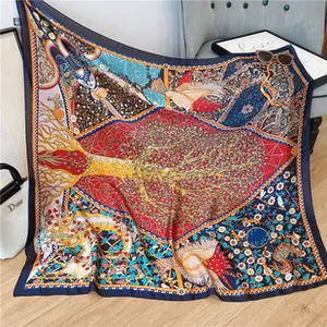 Detail of silk scarf with artistic tree of life pattern draped on a modern grey chair
