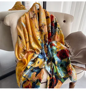 Detail of artistic oil painting print on silk satin shawl draped over a sofa