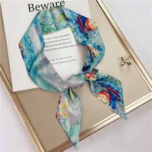 Detail of silk-feel sunflower long neckerchief tied in a bow with oil painting pattern