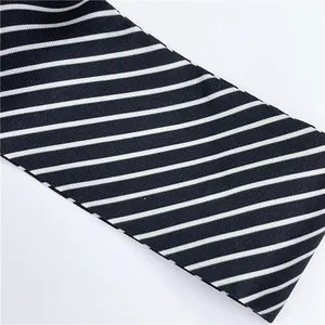 Detail shot of the black and white horizontal stripe pattern on this fashion silk scarf