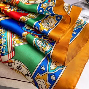 Elegant satin silk scarf with colorful zodiac prints and vibrant floral patterns