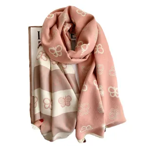 Pink and white striped cashmere scarf with butterfly patterns and soft tassel edges