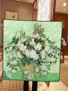 Detailed close-up showing Van Gogh Roses pattern and edge stitching on the silk scarf