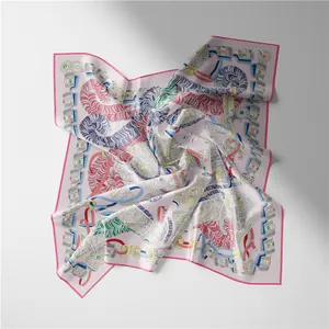 Macro detail of silk scarf featuring colorful feather patterns and baroque chain prints