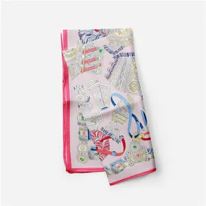 Detail of silk square scarf featuring equestrian patterns with leather straps and metal buckles