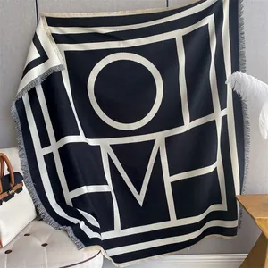 Black and white faux cashmere scarf with HOME letter print and fringe edges for winter