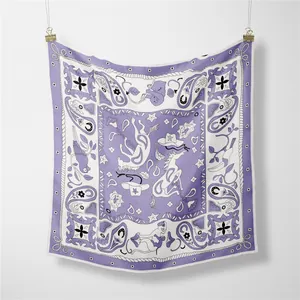 Detail of purple and white square silk scarf with paisley and western cowboy patterns