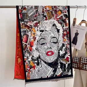 Detail of artistic Marilyn Monroe collage print shawl with fringe on a sleek display