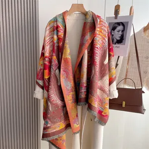 Detail of colorful vintage digital print scarf with thick cashmere-like texture and tassels