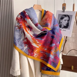 Detailed view of abstract print thick cashmere pashmina with yellow piping and grey fringes