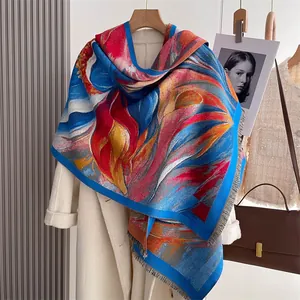 Detail of colorful vintage ethnic style thick scarf with artistic digital print and fringes