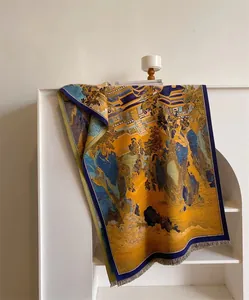 Détail d'une écharpe en cachemire d'hiver avec paysage chinois et bordures à franges