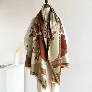 Close-up of vintage floral cashmere-like shawl with elegant fringe and retro scenery