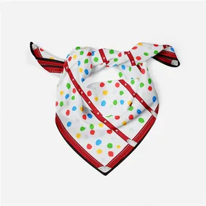 Detail of colorful polka dot pattern and faux leather strap print on 53cm silk scarf