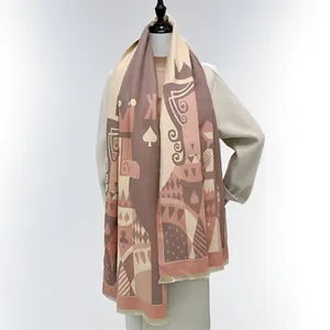 Thick warm scarf with poker patterns, clubs, hearts and letter K in caramel and pink