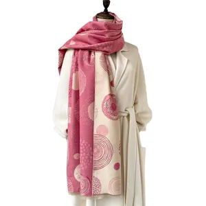 Bohemian style thick cashmere scarf with abstract pink and beige geometric patterns and fringe