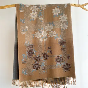 Floral cashmere-like winter scarf in brown with elegant flower patterns and fringe