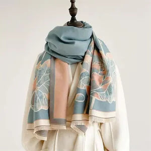 Detail of winter thick floral jacquard scarf shawl with Morandi blue and pink leaf patterns