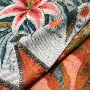 Macro shot of thick floral tapestry shawl with tassel edges and detailed oil painting texture