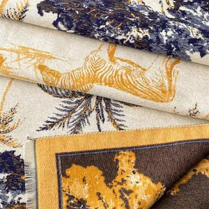 Detail of jacquard weave showing zebra and palm tree toile de jouy pattern and fine tassels