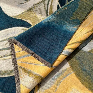 Macro detail of winter oil painting style scarf with floral jacquard and tassel edges