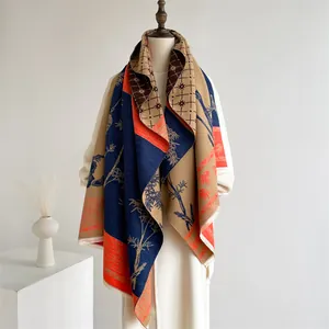 Detailed view of vintage ethnic color-block cashmere shawl with soft fringes and bamboo patterns