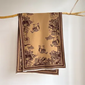 Elegant beige cashmere-style scarf with vintage elephant jacquard and tassels