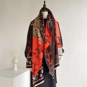 Detailed macro view of retro ethnic style scarf with ink bamboo pattern and tassel edge