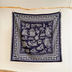 Macro detail of nautical cashew floral print scarf with soft fringe edges and sailing ship pattern