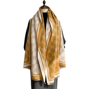 Thick warm cashmere-like shawl with yellow floral jacquard and contrast stripe borders