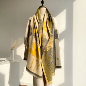 Detail of floral cashmere-style shawl with fringe edge and elegant Chinese pattern