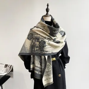 Detail view of beige and grey camellia floral pattern scarf with delicate fringe trim