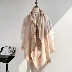 Close-up of elegant camellia pattern and soft fringes on two-tone cashmere pashmina shawl