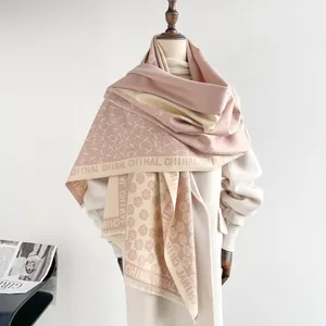Detail of soft nude pink and beige cashmere-like fabric with floral jacquard texture