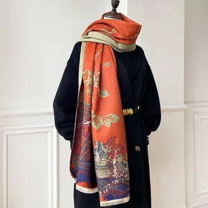 Close-up of cashmere-feel oriental floral garden scarf draped over a black coat