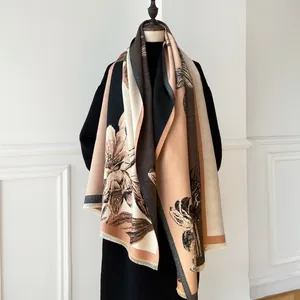 Detail of vintage floral cashmere scarf showing thick texture and tassel edge craftsmanship