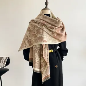 Detail of vintage cashmere-like scarf with brown scenery print and fringe trim