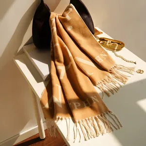 Thick camel cashmere-like winter scarf with elegant letter jacquard and tassel edges