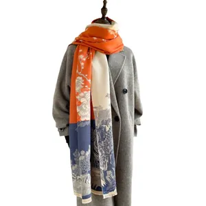 Chinese style cashmere-feel scarf with orange, beige, and blue mountain landscape pattern
