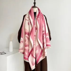 Detail of floral lotus pattern and fringe on thick winter pashmina shawl scarf