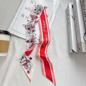 Vintage floral silk scarf with red butterflies and France Paris text on stylish background