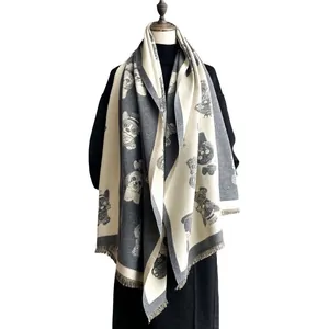Double-sided dog jacquard cashmere-feel scarf with fringes in grey and white