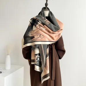Detail of artistic jacquard pattern and soft fringe on vintage thickened warm winter scarf