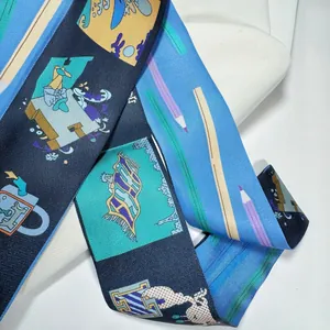 Detail of blue silk twilly featuring intricate cartoon illustration and twill texture